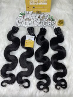 Alternative view of Body Wavy Machine Weft Hair Extensions #1B Natural Color