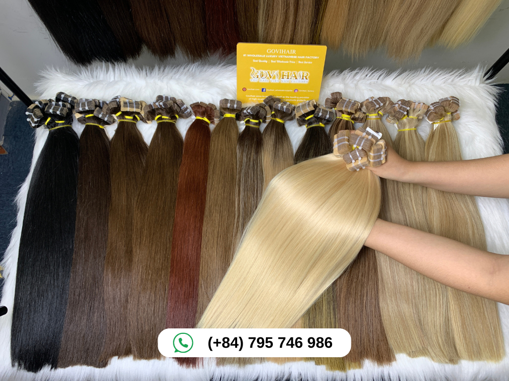 How Long Do Hair Extensions Last? An Complete Guide 10 A colorful range of tape-in hair extensions in various shades