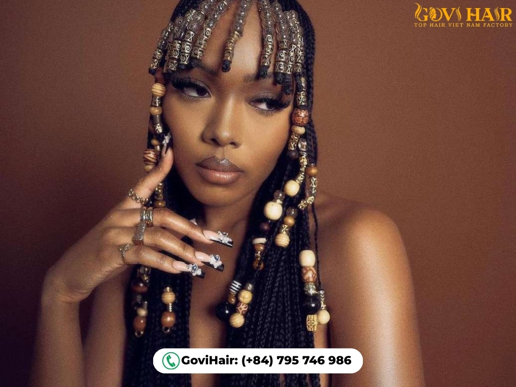 90s beaded braids hairstyle with plaits