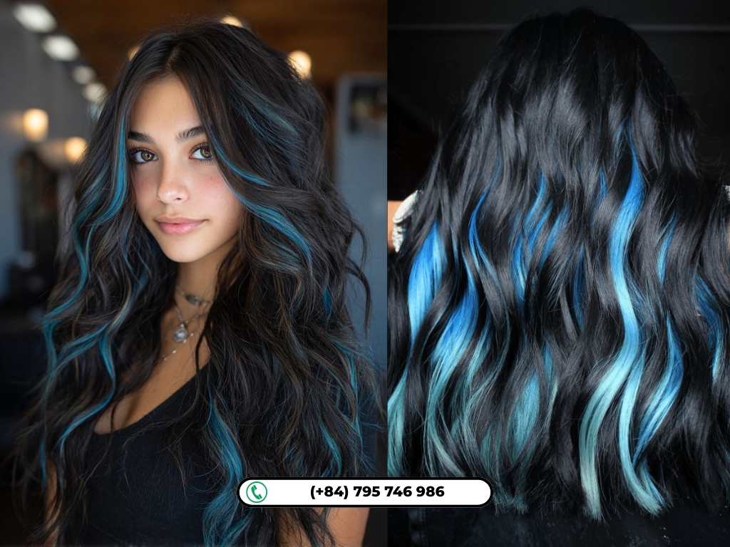 Soft pastel blue highlights add a dreamy touch to long black hair.