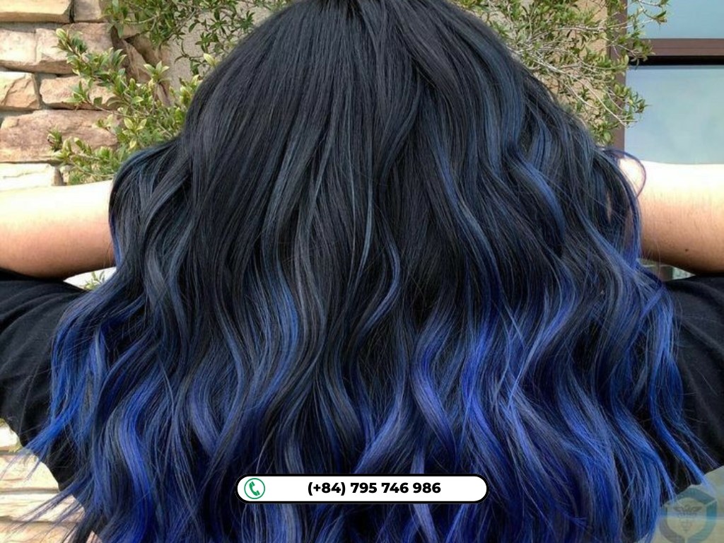 An intense blue-black shade gives mid-length hair a rich, dramatic look.