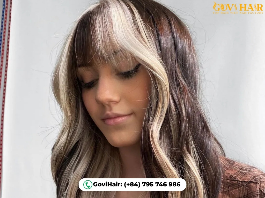 Blonde hair featuring bold accent fringe