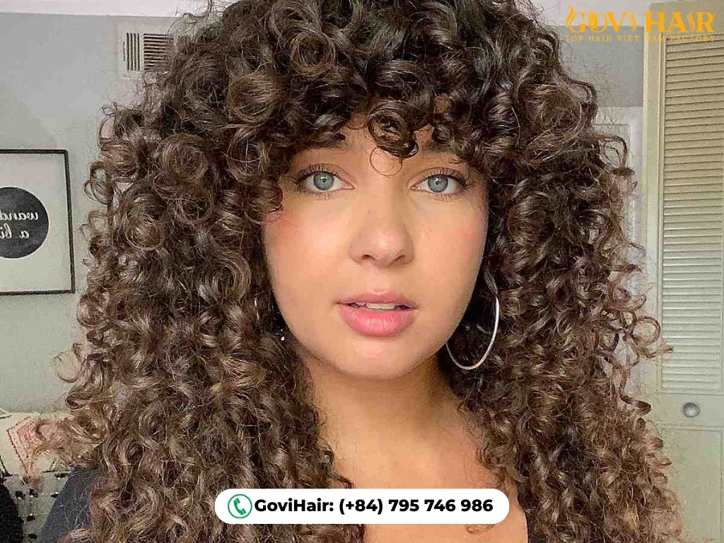 Curly quick weave hairstyle with volume