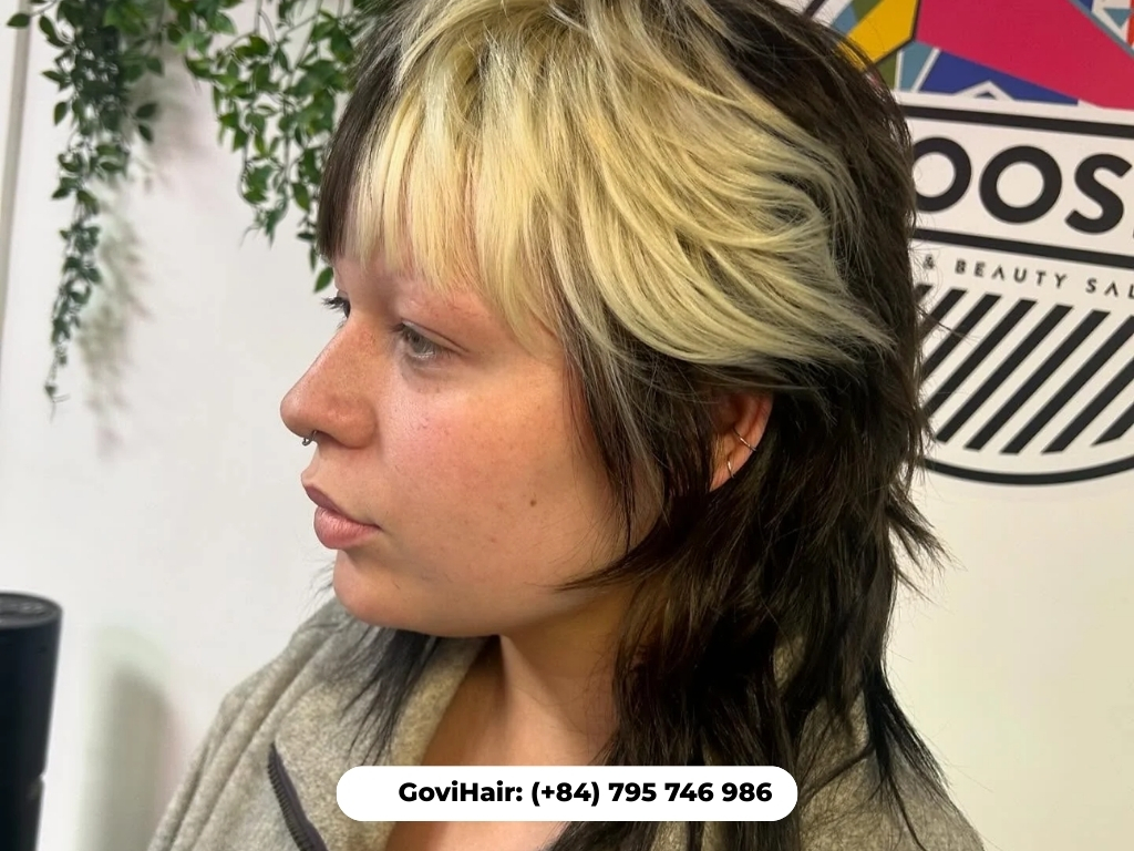 Edgy two-tone wolf cut layers