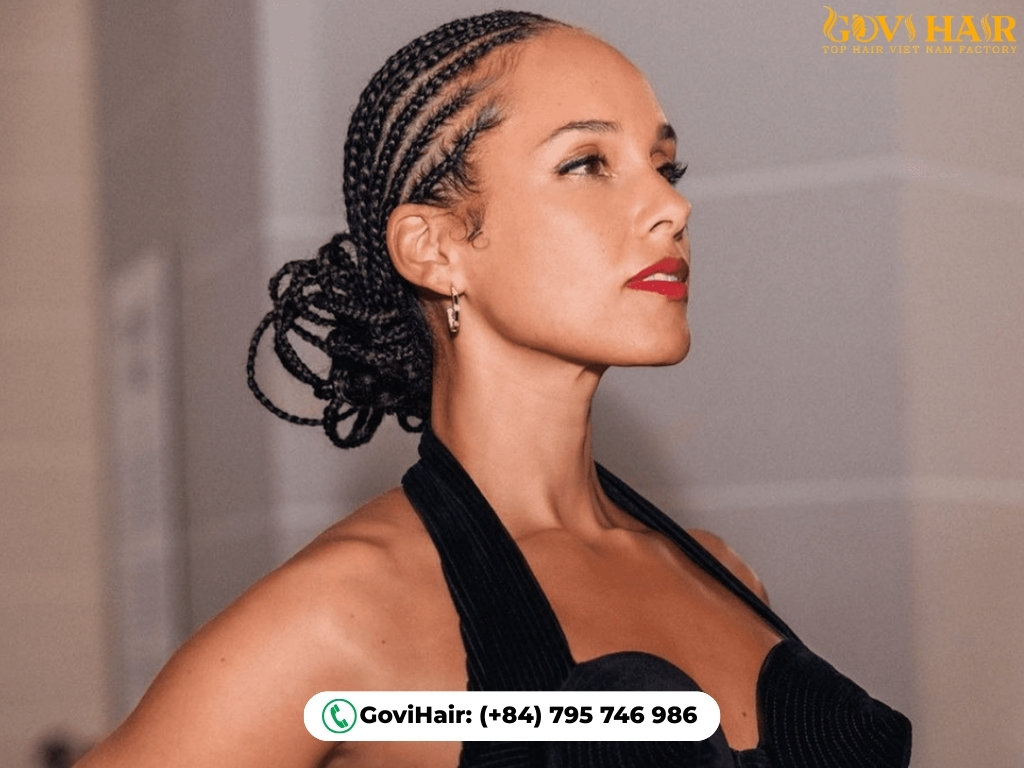 Face-framing Fulani braids with cowries