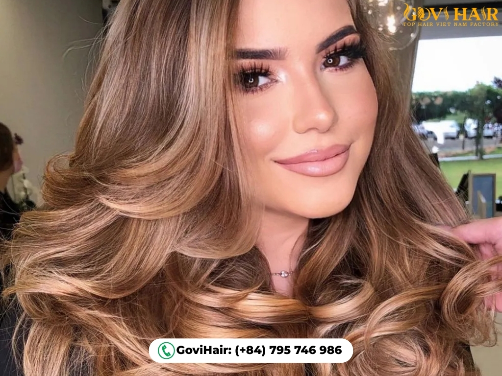 Golden brown hair with amber highlights