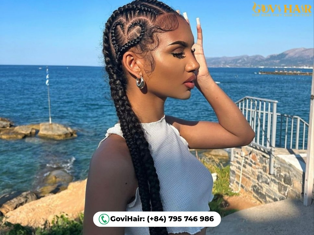 Heart-shaped cornrow braids 90s hairstyle