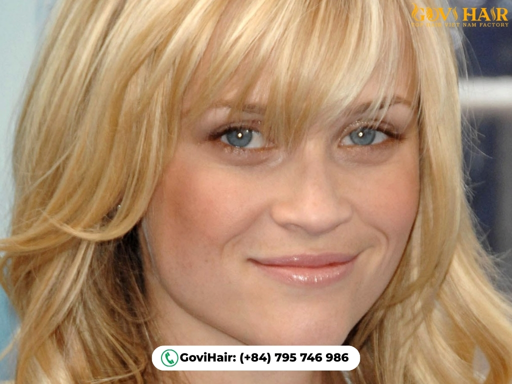 Bangs vs No Bangs: Which One Is Right For You? 17 Heart-shaped face with bangs balances forehead and chin