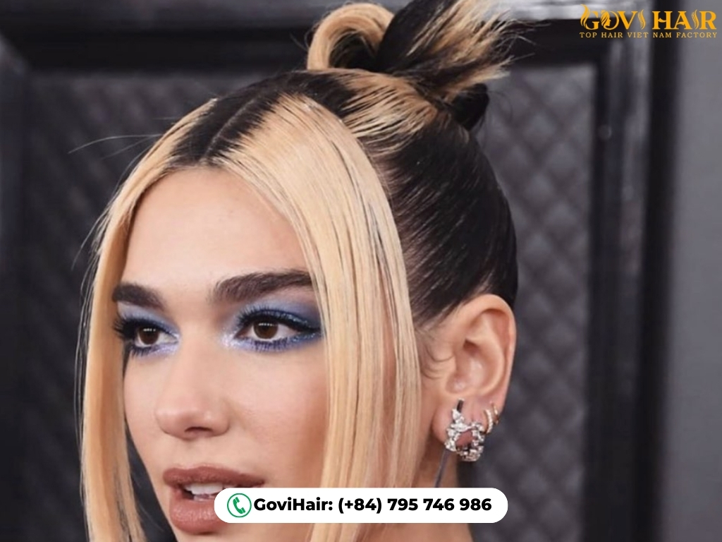 High-contrast skunk stripe updo hair