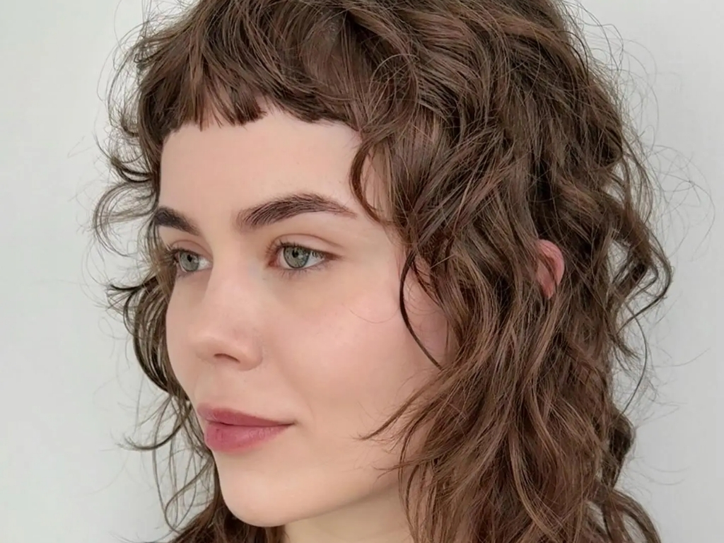 Micro-fringe wolf cut with bold bangs