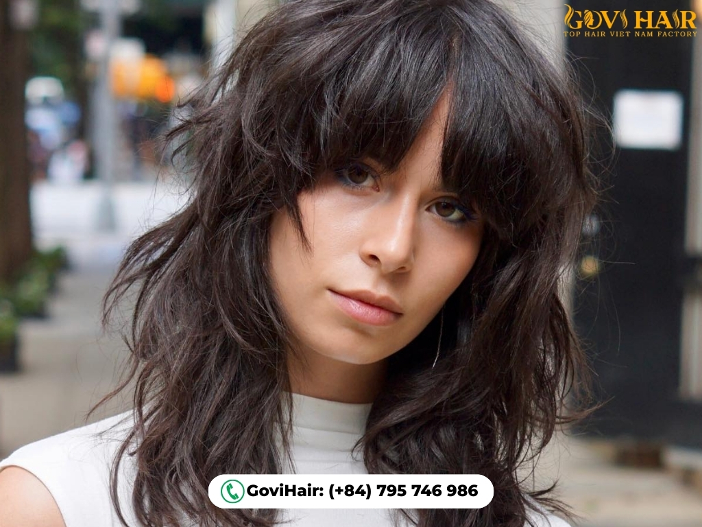 Rebellious shaggy layered wolf cut with textured, wispy ends