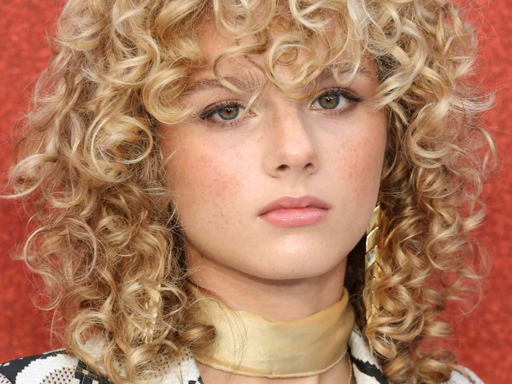 Soft layered wolf cut for natural curls