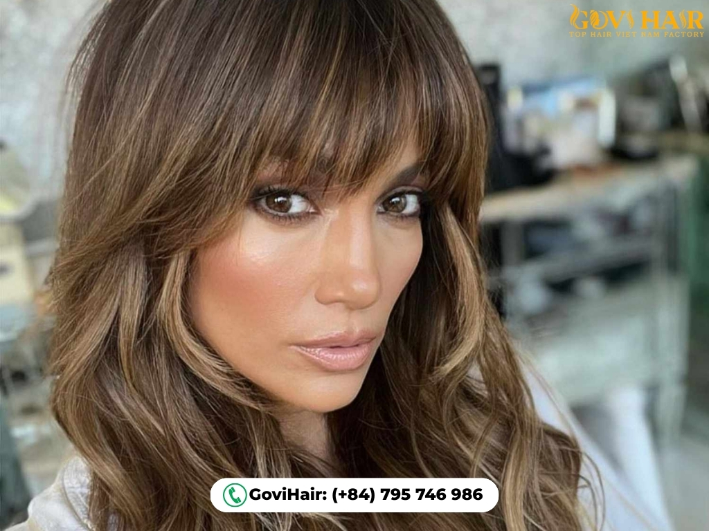 Textured wolf cut with multiple layers and voluminous bangs