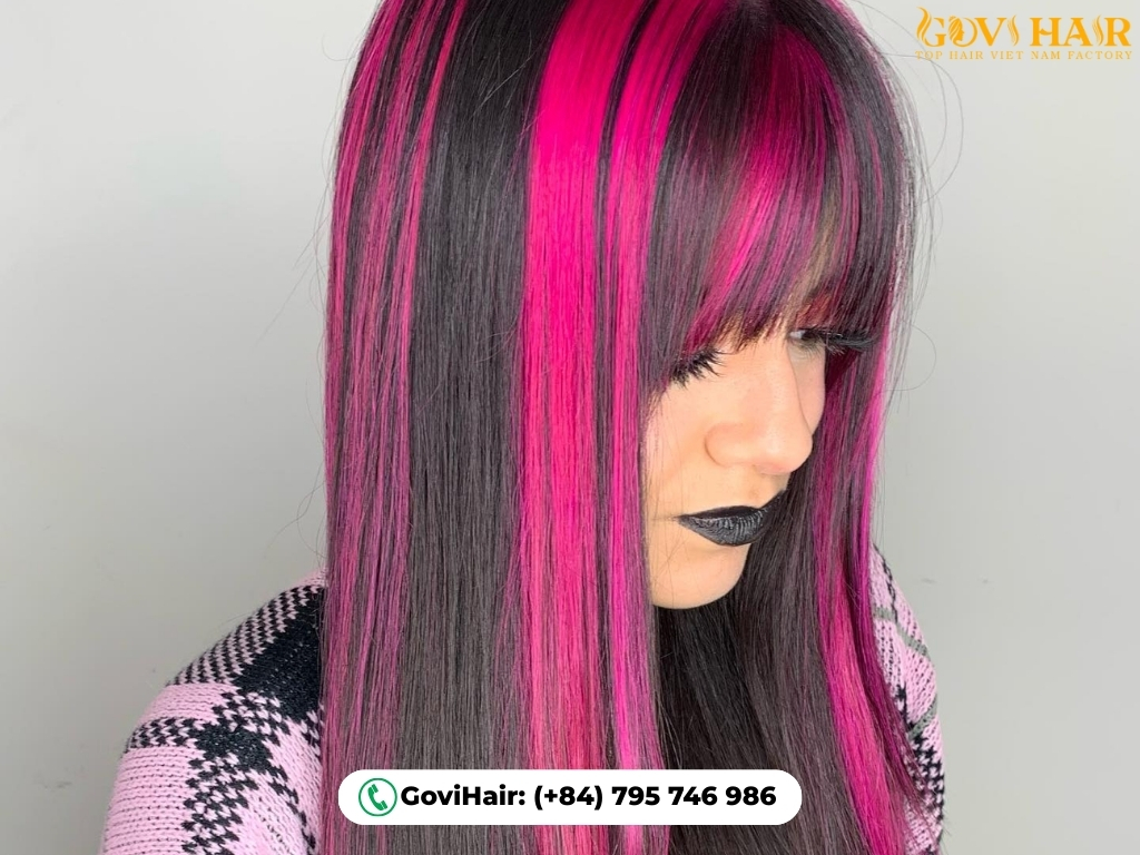 Two-tone hair with hot pink accents