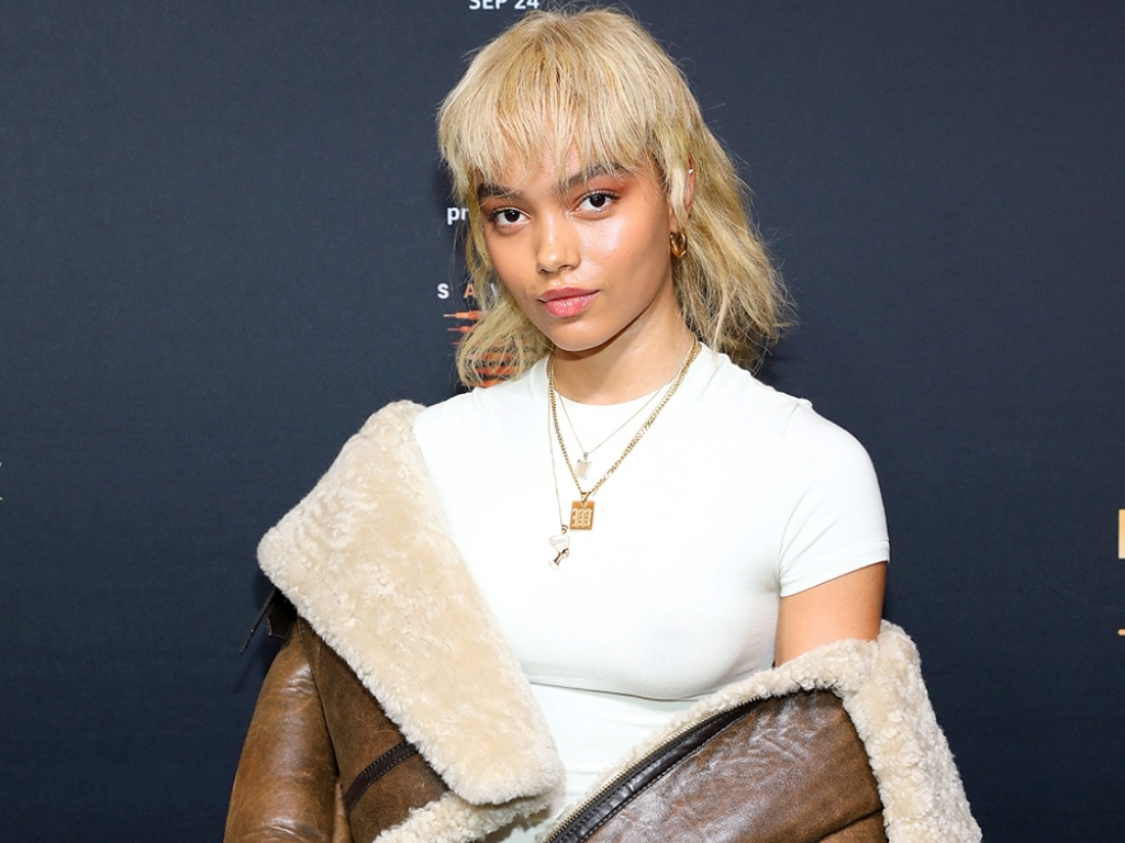 Whitney Peak's blonde layered wolf cut with textured, effortless style