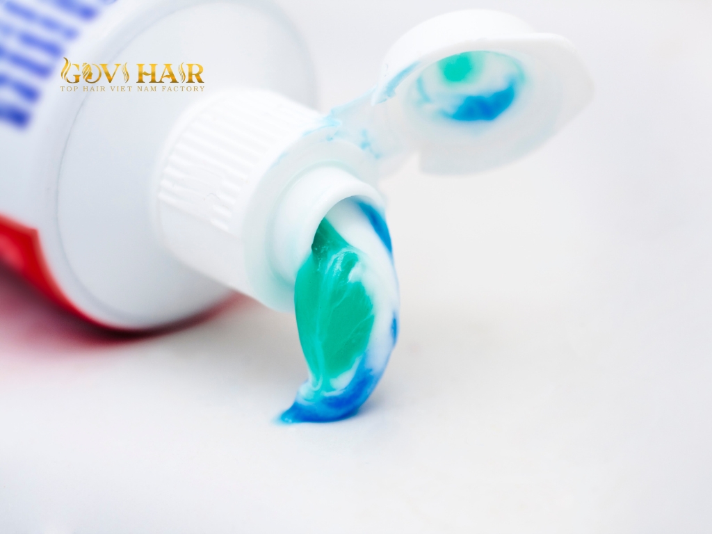 White, non-gel toothpaste contains mild abrasives that can help fade dye stains