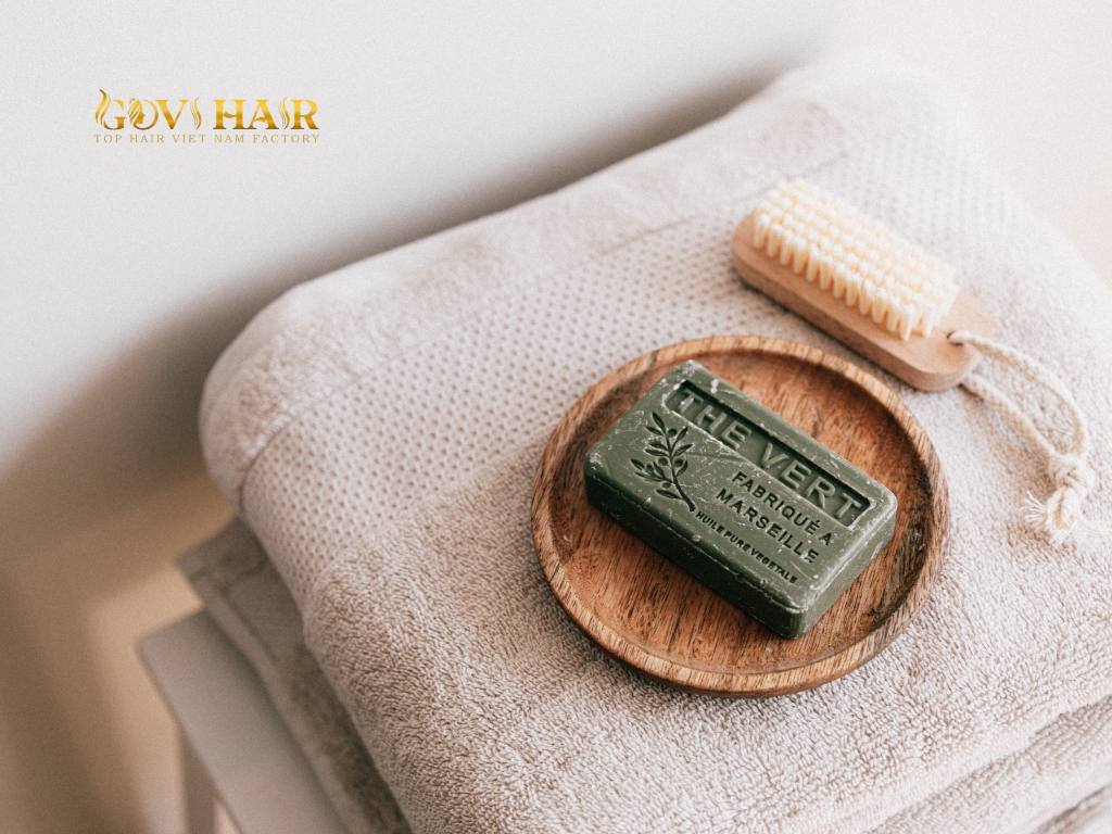 Dish soap can cut through oils and pigment