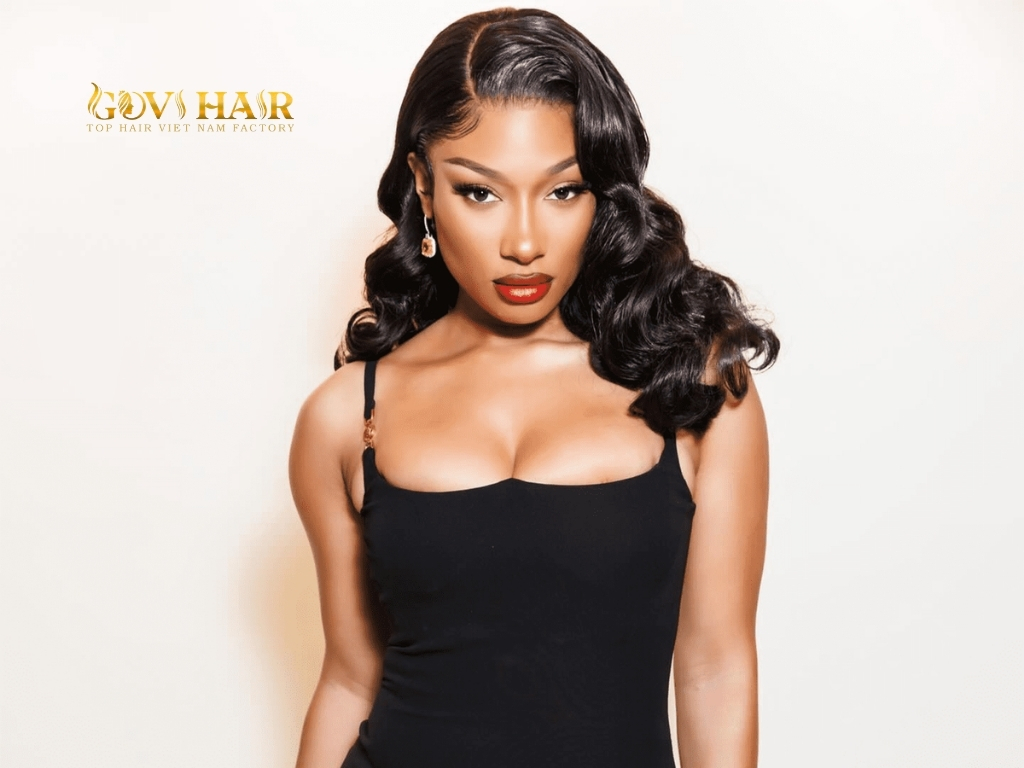 Cool-toned platinum drop effortlessly over her shoulders