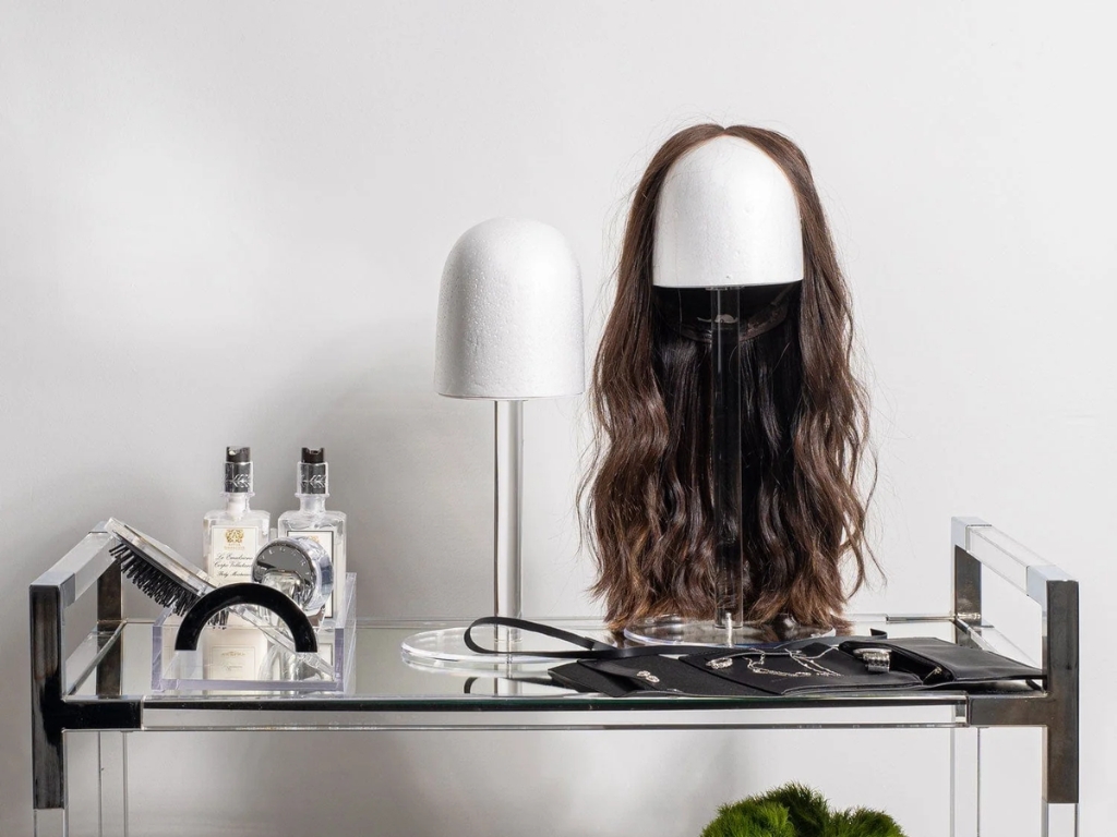 A wig stand is the best way to maintain shape and encourage airflow for daily wear.