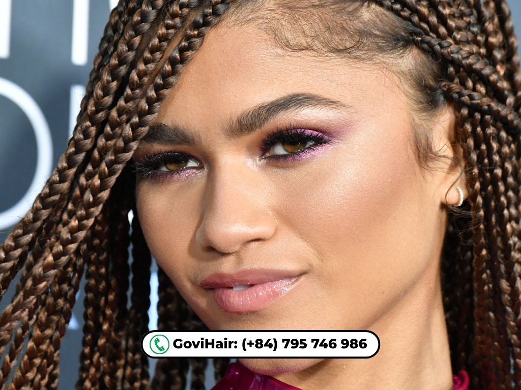 Sleek and straight knotless braids hairstyle