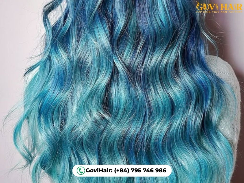 Mermaid Blue Layered Waves create flowing, water-like layered hair