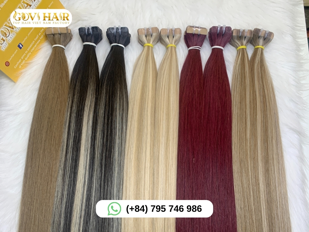Tape-in hair extensions with adhesive strips