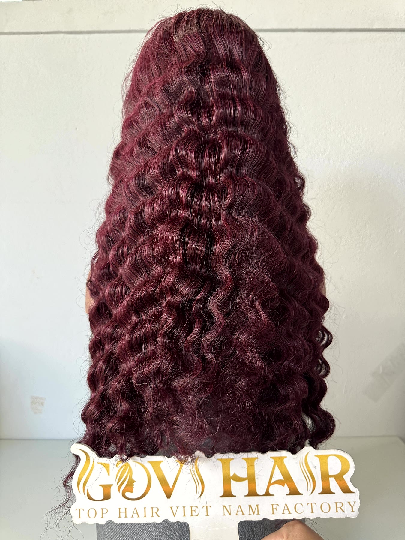 Burgundy Human Hair Wig 6x6 Closure 22 Inch Deep Wave 180% Density 4 Burgundy human hair wig curls back view