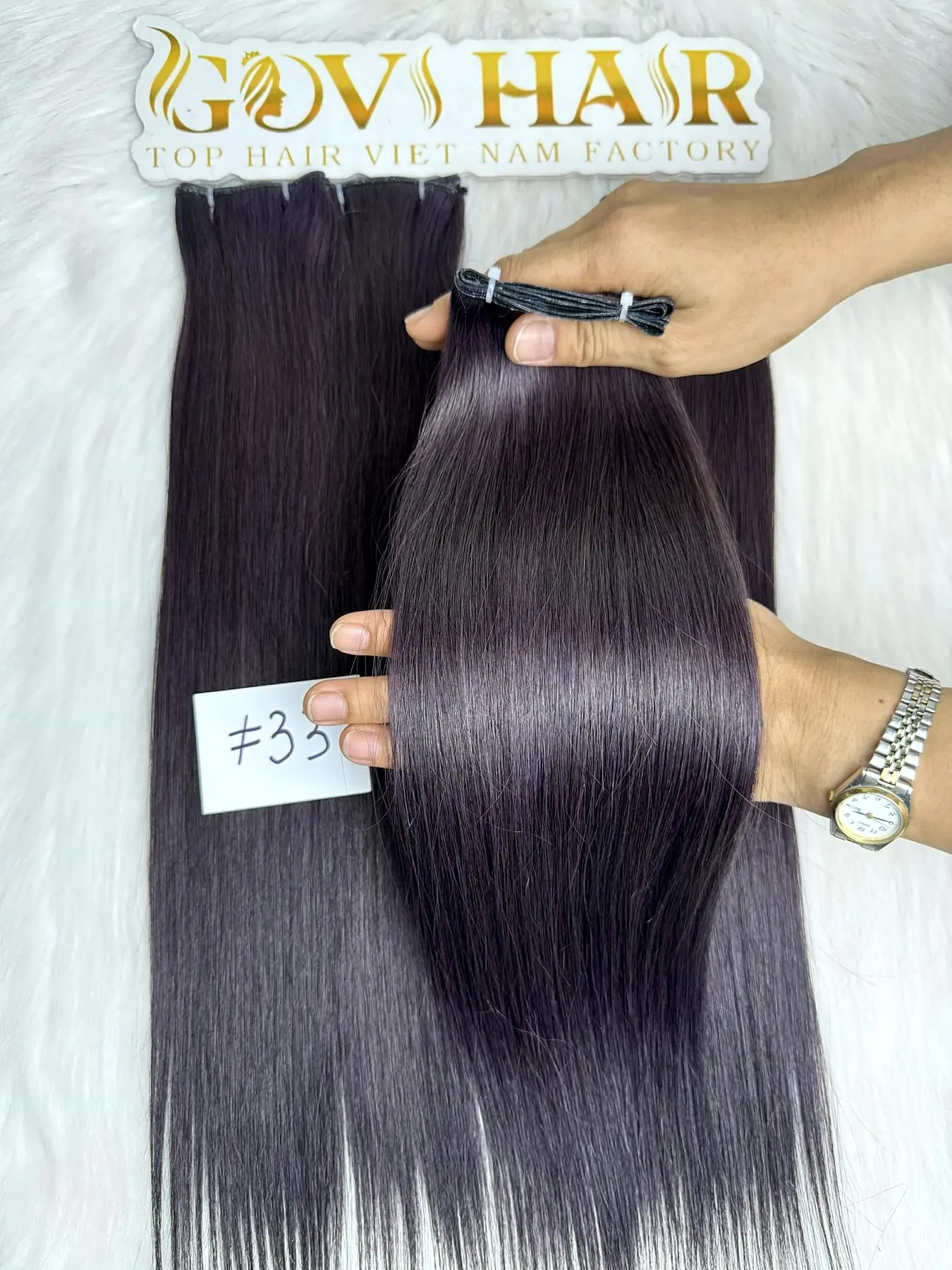 Genius Weft Wholesale 16 Inch #33 Color Bone Straight Human Hair 1 Genius weft wholesale #33 colour held by hand