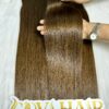 Genius Weft Extensions 18 Inch Bone Straight Dark Brown Human Hair 8 Genius weft extensions dark brown held by hand