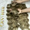 Genius Wefts Hair Extensions 22 Inch Natural Wave Mix Piano Color 7 Genius wefts hair extensions mix piano held by hand
