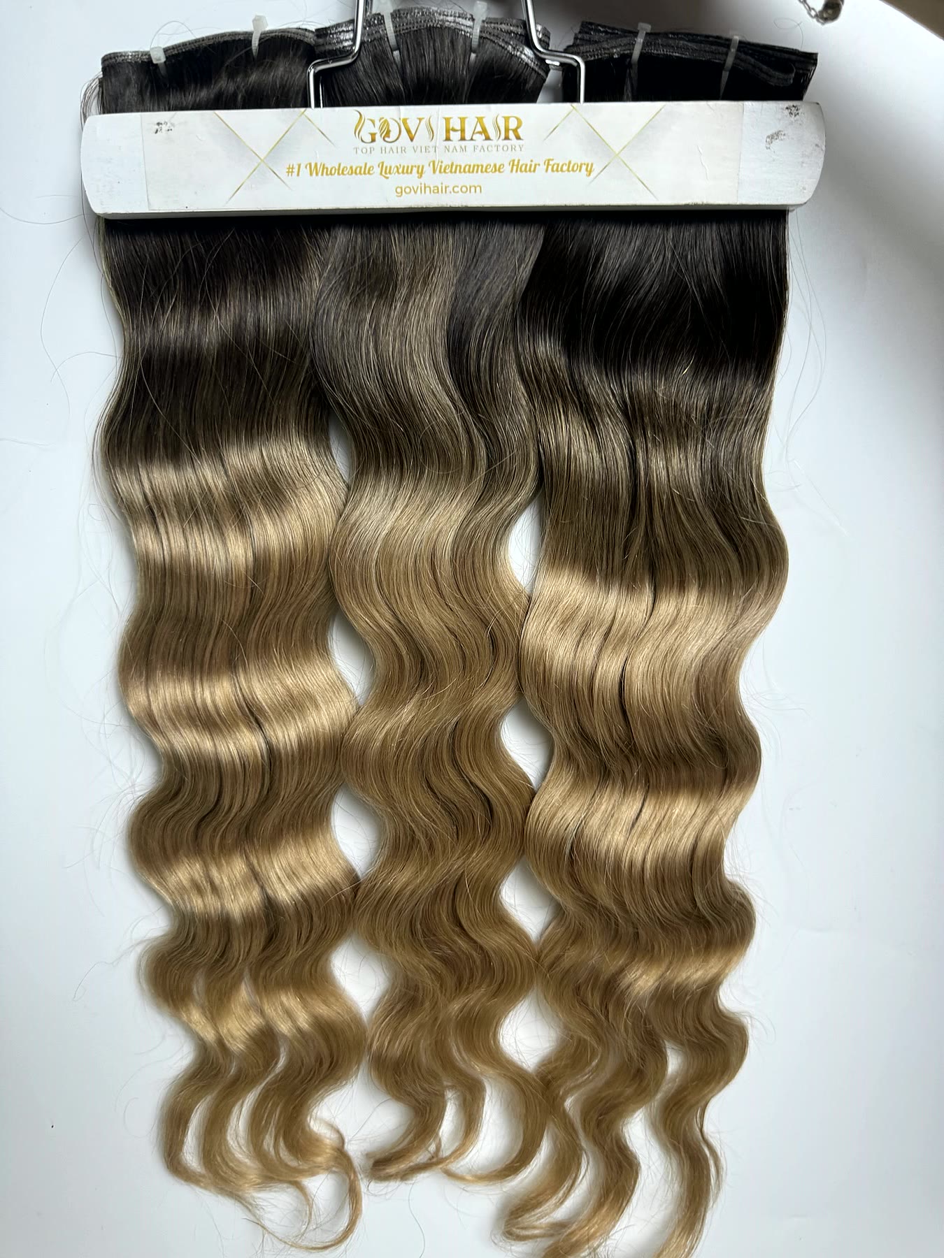 Wavy Genius Weft Extensions 20 Inch Ombre Blonde Natural Wave Raw Hair 3 Wavy genius weft extensions ombre blonde on hanger
