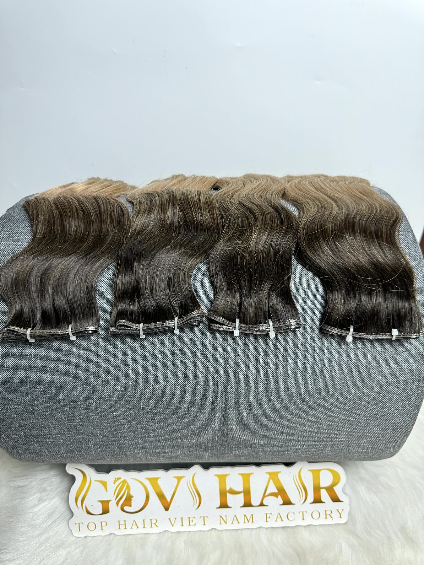 Wavy Genius Weft Extensions 20 Inch Ombre Blonde Natural Wave Raw Hair 4 Wavy genius weft extensions ombre blonde on roller