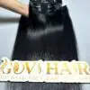 clip in hair extensions held by hand showing shine