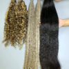 24 Inch I Tip Raw Hair Extensions Natural Straight Natural Black Wholesale 6 I tip hair extensions held by hand showing shine