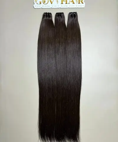 raw hair bundles in natural brown close up view 2