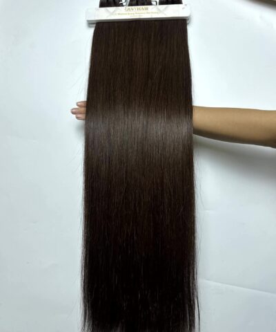raw hair bundles in natural brown close up view 5