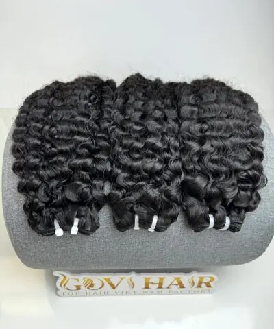 Burmese curly bundles 22 inch on stand