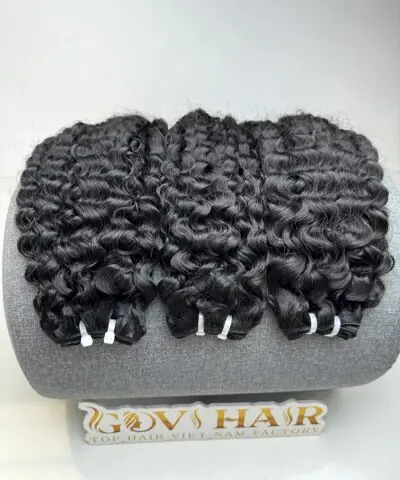 Burmese curly bundles 22 inch raw weft close