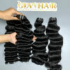 raw hair bundles with deep curly and natural wave held by hand showing shine