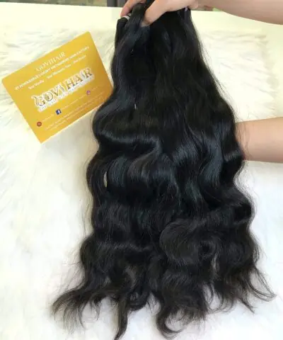 Natural wave hair bundles held by hand 22 inch