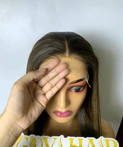 Highlight wig human hair held by hand