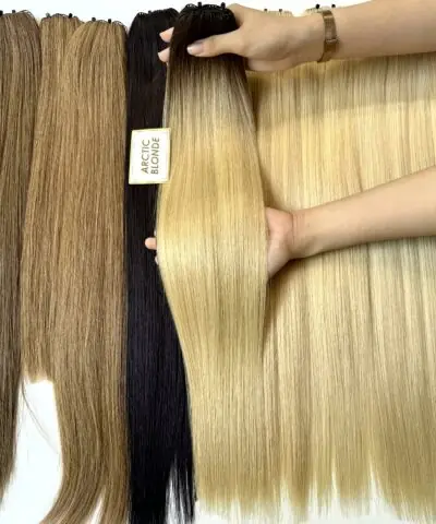 Arctic blonde hair extensions next to other shades