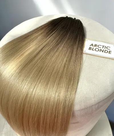 Rooted arctic blonde hair extensions feather weft