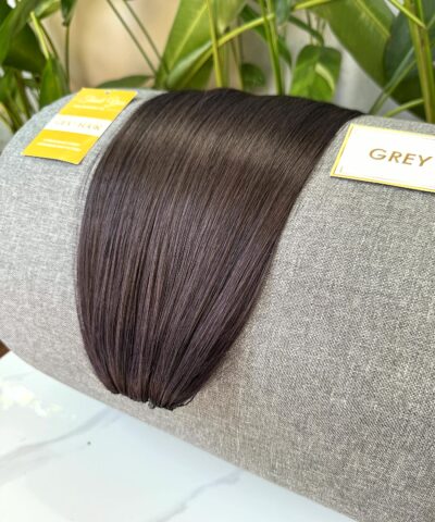 Grey feather weft hair extensions with Govihair label
