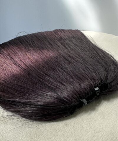 Hand knotted bonds on grey feather weft hair extensions