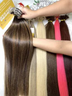 Alternative view of Straight Tape In Hair Extensions Piano Color