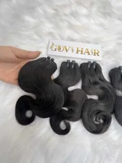 Alternative view of Body Wavy Machine Weft Hair Extensions #1B Natural Color