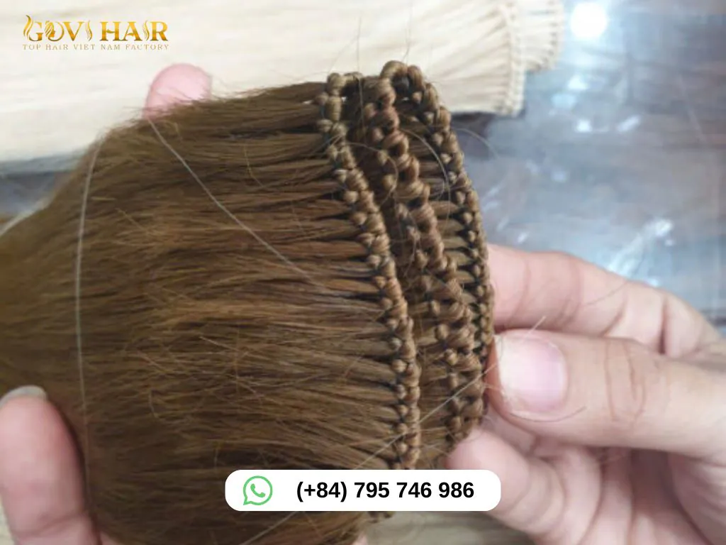 Hand tied weft hair extension with ultra-flat lightweight seam