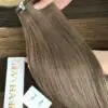 20 Inch Straight #7 Medium Blonde Genius Weft Hair Extensions 100% Virgin Hair 4 Genius Weft Hair Extensions 20 Inch #7 Dark Blonde Color