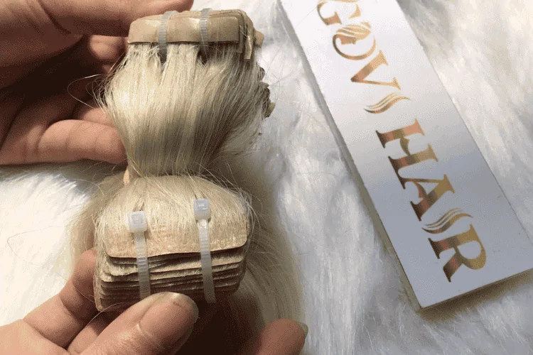 Tape-in hair extensions has affixed strands using adhesive tapes